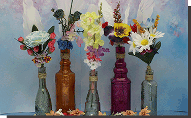 Floral Bouquet in vintage Message Bottles
